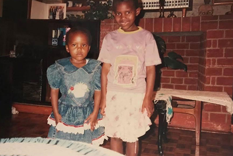 Daisy (right) and Edith Serem at their home in Nairobi, Kenya, in the early 1990s
