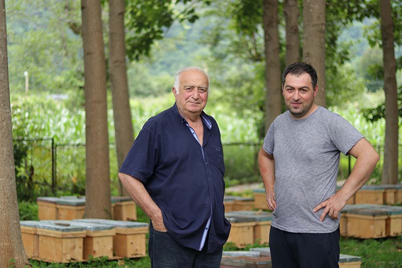 Givi and Levan Ninidze at their apiary in Georgia.
