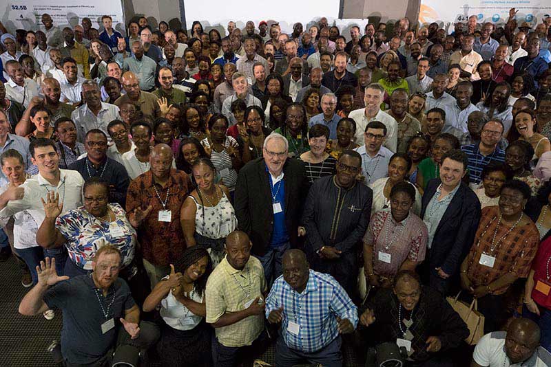 Philippe Le Houérou with IFC staff members in Mookgopong, South Africa in 2018.