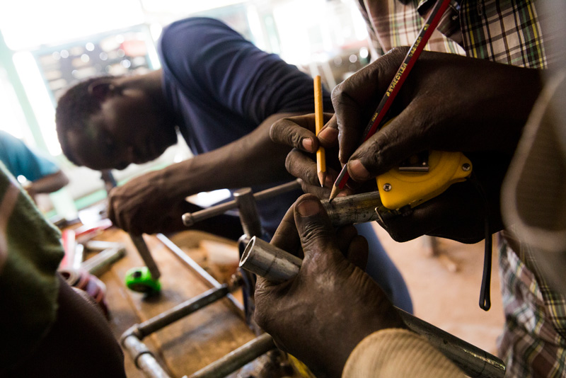 Refugees learn new skills as they take plumbing classes in the Kakuma Refugee Camp.